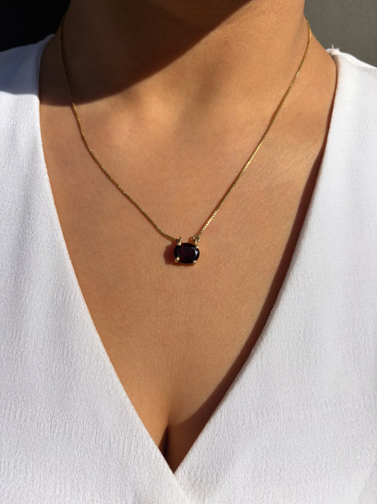 All Eyes On me Garnet Oval Pendant.