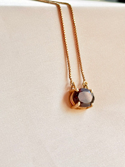 All Eyes On me Garnet Oval Pendant.